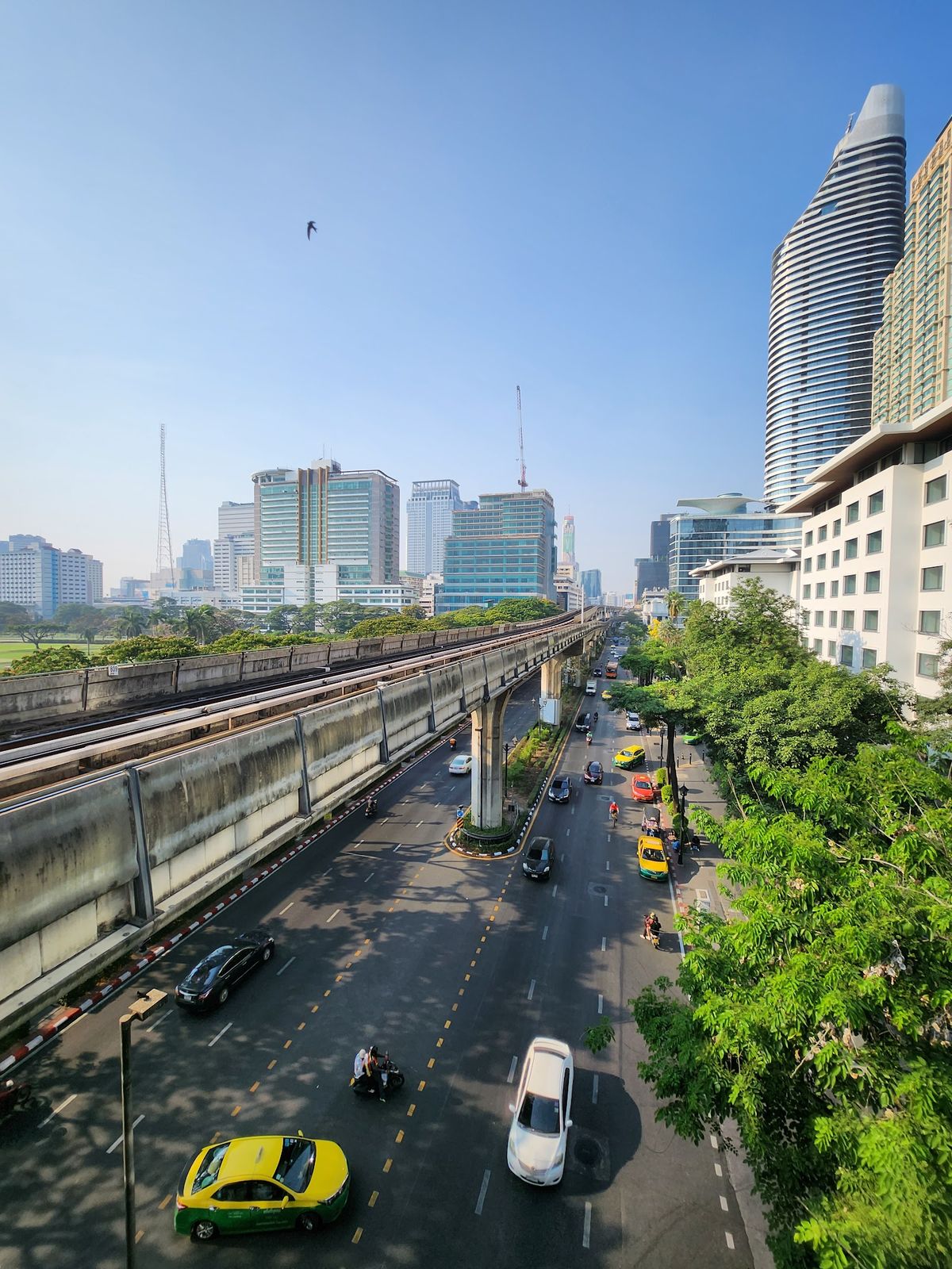 The St. Regis Bangkok — luxury hotel tower on Rajadamri Road overlooking Royal Bangkok Sports Club racecourse