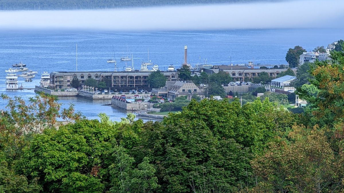 Bar Harbor and Frenchman Bay at dawn — granite peaks of Acadia National Park rising over Mount Desert Island, Maine