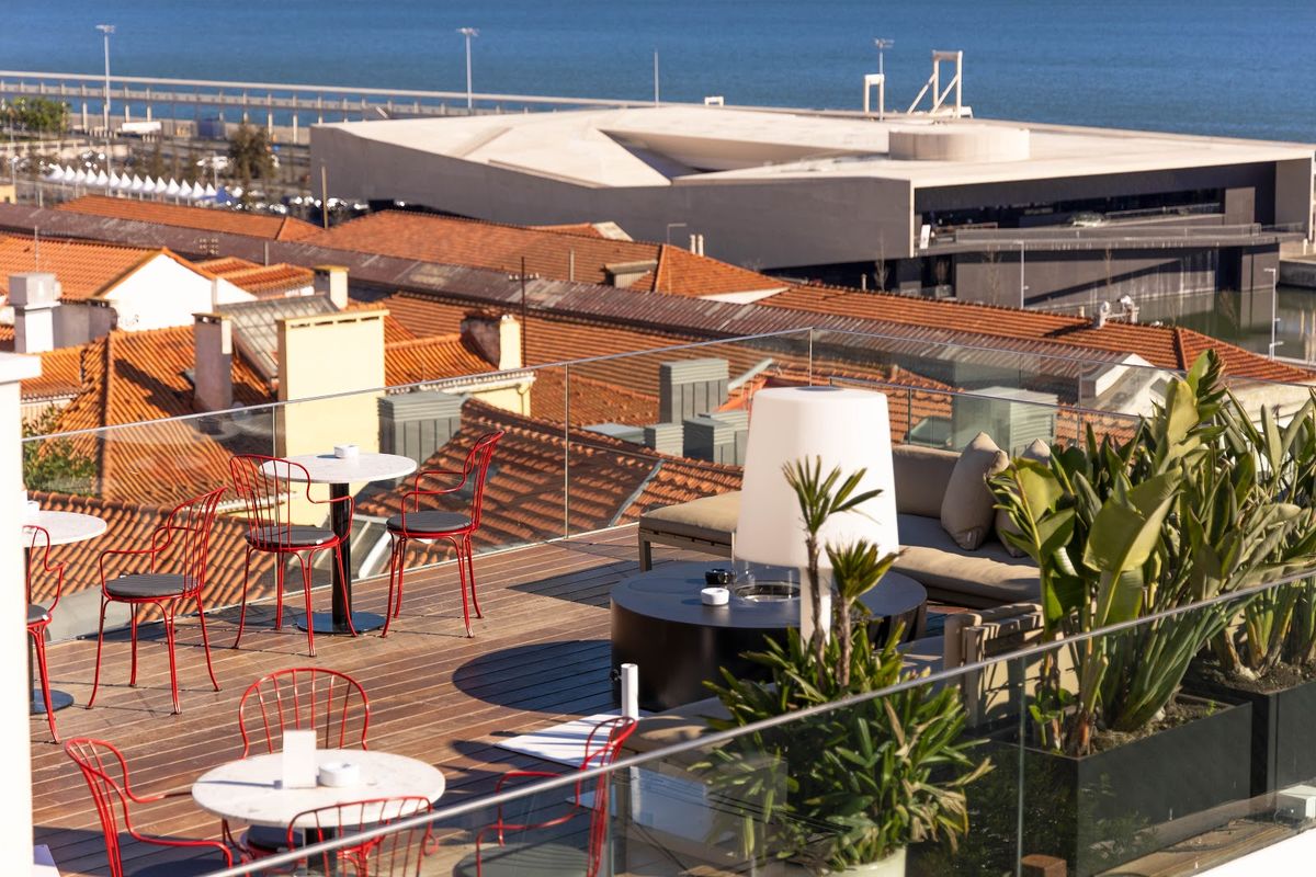 Memmo Alfama — boutique hotel terrace overlooking the rooftops of Alfama with