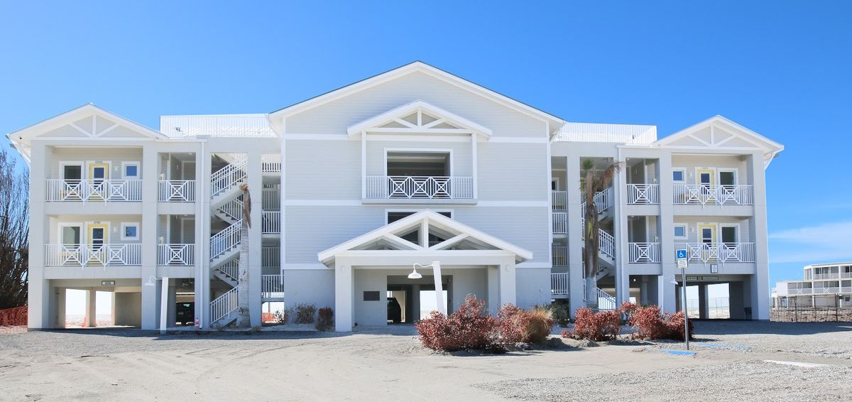 The Beachview Cottages Sanibel — pastel beach cottages on East Gulf Drive with private screened porches